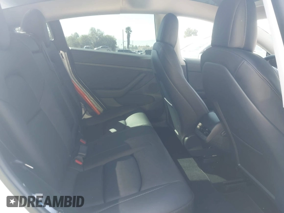 2022 Tesla Model 3 Long Range z VIN 5YJ3E1EB8NF212930, wystawiony jako IAAI lot #41658127 z przebiegiem 43 773 mil mil oraz . Historia ofert i sprzedaży dostępna na DreamBid. Obrazek 8.