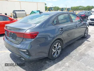 2021 Kia Forte LXS with VIN 3KPF24AD1ME353955, listed as a IAAI auction lot 42160127 with 61,719 mi miles. Bid and sale history available at carsss.com. Image 4.