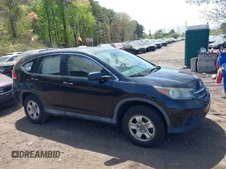 2014 Honda CR-V LX with VIN 2HKRM4H35EH607703, listed as a IAAI auction lot 42162568 with 174,238 mi miles and . Bid and sale history available at carsss.com. Image 13.