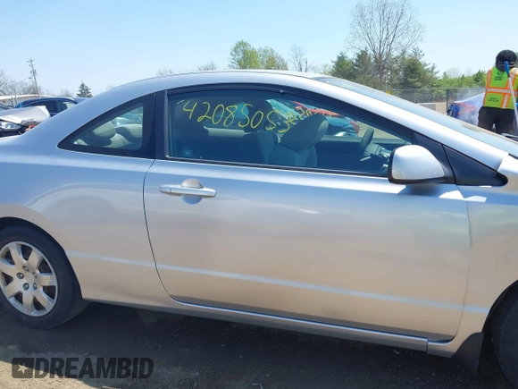 2010 Honda Civic Cpe LX with VIN 2HGFG1B67AH535385, listed as a IAAI auction lot 42085053 with 150,803 mi miles. Bid and sale history available at carsss.com. Image 13.