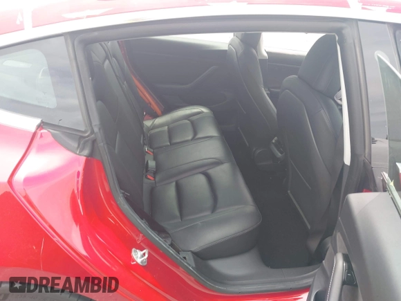 2020 Tesla Model 3 Standard Range Plus z VIN 5YJ3E1EA7LF806266, wystawiony jako IAAI lot #42242694 z przebiegiem 42 044 mil mil oraz . Historia ofert i sprzedaży dostępna na DreamBid. Obrazek 8.