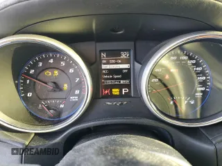 2012 Jeep Grand Cherokee SRT8 with VIN 1C4RJFDJ2CC265421, listed as a Copart auction lot 48654325 with 115,514 mi miles and Salvage Title. Bid and sale history available at carsss.com. Image 9.