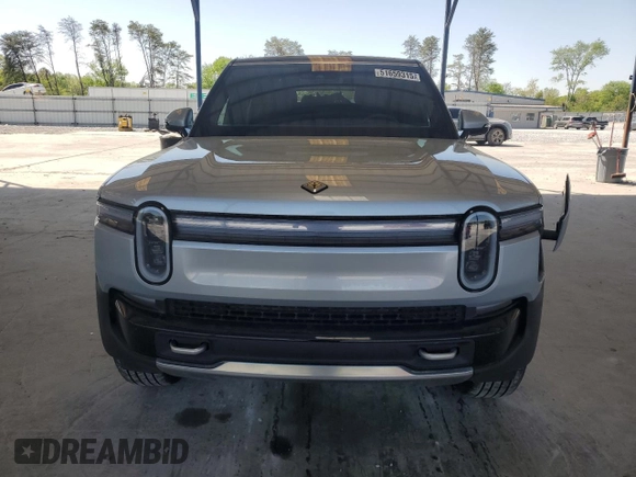 2025 Rivian R1S Adventure z VIN 7PDSGBBA9SN052652, wystawiony jako Copart lot #51659315 z przebiegiem 4012 mil mil oraz Szkody całkowita. Historia ofert i sprzedaży dostępna na DreamBid. Obrazek 5.