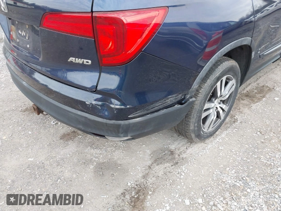 2016 Honda Pilot EX-L with VIN 5FNYF6H55GB050991, listed as a IAAI auction lot 41943049 with 158,255 mi miles. Bid and sale history available at carsss.com. Image 19.