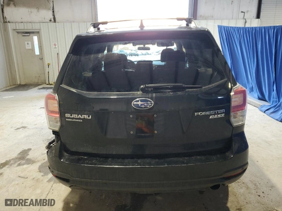 2017 Subaru Forester Touring with VIN JF2SJAWC8HH564037, listed as a Copart auction lot 87677265 with 114,986 mi miles and Salvage Title. Bid and sale history available at carsss.com. Image 6.