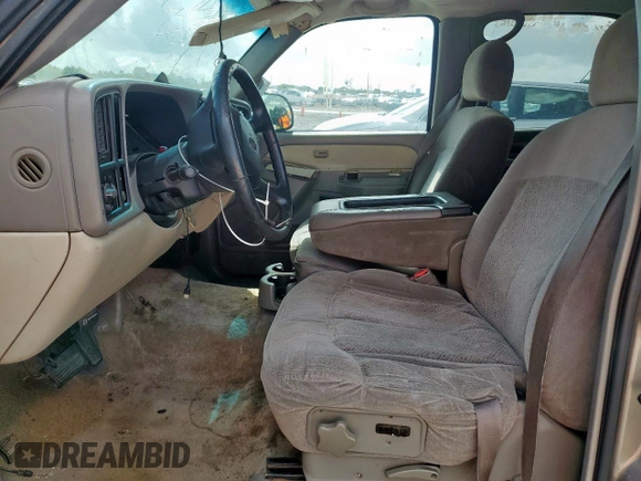 2002 Chevrolet Tahoe LS z VIN 1GNEC13V92R136479, wystawiony jako Copart lot #59803055 z przebiegiem 165 718 mil mil oraz Czysty tytuł • Clean title. Historia ofert i sprzedaży dostępna na DreamBid. Obrazek 7.