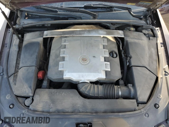 2009 Cadillac CTS AWD z VIN 1G6DS57V390110289, wystawiony jako Copart lot #49331995 z przebiegiem 146 254 mil mil oraz Szkoda całkowita • Salvage title. Historia ofert i sprzedaży dostępna na DreamBid. Obrazek 13.
