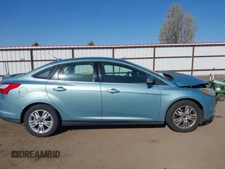 2012 Ford Focus SEL with VIN 1FAHP3H23CL417403, listed as a IAAI auction lot 42043152 with 140,604 mi miles. Bid and sale history available at carsss.com. Image 13.