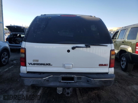 2002 GMC Yukon XL SLT with VIN 1GKEC16T62J193518, listed as a Copart auction lot 73010524 with 246,849 mi miles and Salvage Title. Bid and sale history available at carsss.com. Image 6.