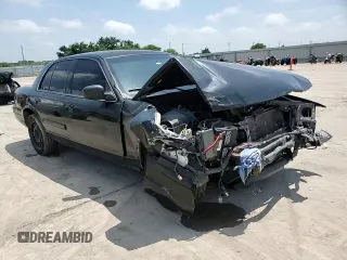 2010 Ford Police Interceptor with VIN 2FABP7BV9AX110091, listed as a Copart auction lot 60065205 with Not provided miles and Salvage title. Bid and sale history available at DreamBid. Image 13.