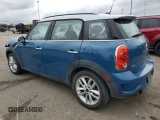 2012 MINI Countryman S with VIN WMWZC3C57CWL86423, listed as a Copart auction lot 57584195 with 102,184 mi miles and Salvage title. Bid and sale history available at DreamBid. Image 2.