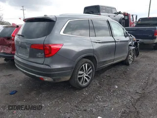 2016 Honda Pilot Touring with VIN 5FNYF6H93GB003106, listed as a IAAI auction lot 41989772 with 110,123 mi miles. Bid and sale history available at carsss.com. Image 4.