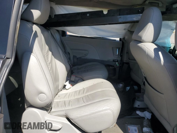 2012 Toyota Sienna XLE AAS with VIN 5TDYK3DC4CS197176, listed as a Copart auction lot 57942845 with Not provided miles and Salvage title. Bid and sale history available at DreamBid. Image 11.