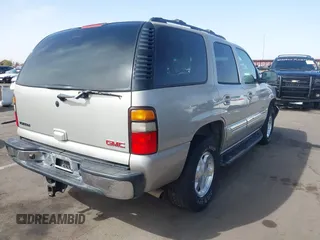 2004 GMC Yukon SLT with VIN 1GKEK13Z54R144181, listed as a IAAI auction lot 41702834 with 146,827 mi miles. Bid and sale history available at carsss.com. Image 4.