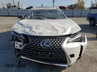 2025 Lexus UX with VIN JTHYBJAHXS2013108, listed as a Copart auction lot 45136895 with 1,350 mi miles and Salvage title. Bid and sale history available at DreamBid. Image 5.