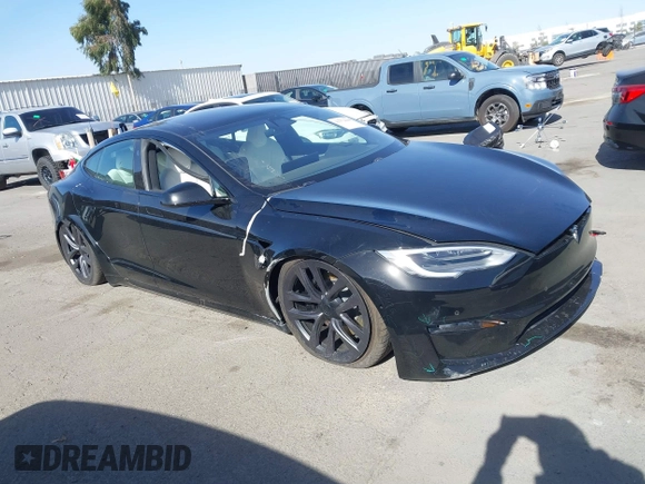 2022 Tesla Model S Plaid with VIN 5YJSA1E62NF460634, listed as a IAAI auction lot 41372644 with 16,050 mi miles and . Bid and sale history available at DreamBid. Image 13.