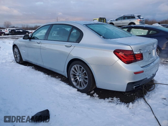 2014 BMW 7 Series 740Li xDrive with VIN WBAYF4C57ED281954, listed as a Copart auction lot 85297394 with 63,535 mi miles and Salvage Title. Bid and sale history available at carsss.com. Image 2.