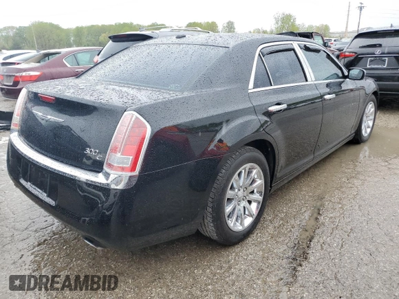 2013 Chrysler 300 C z VIN 2C3CCAET1DH568910, wystawiony jako Copart lot #50037004 z przebiegiem 136 228 mil mil oraz Szkoda całkowita • Salvage title. Historia ofert i sprzedaży dostępna na DreamBid. Obrazek 3.