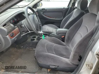 2001 Chrysler Sebring LX z VIN 1C3EL46X21N656640, wystawiony jako Copart lot #58402415 z przebiegiem 85 594 mil mil oraz Tytuł czysty. Historia ofert i sprzedaży dostępna na DreamBid. Obrazek 7.