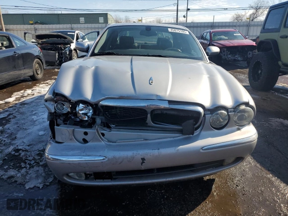 2004 Jaguar XJ with VIN SAJEA71C04SG04022, listed as a Copart auction lot 45875105 with 153,453 mi miles and Salvage Title. Bid and sale history available at carsss.com. Image 5.