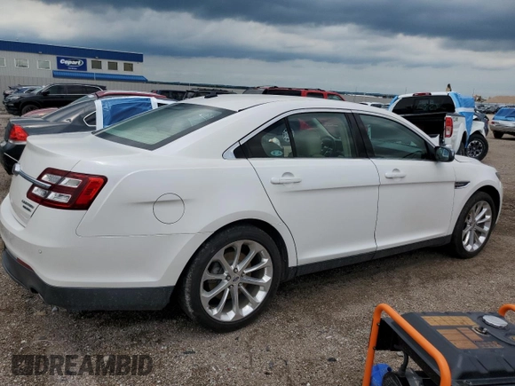 2015 Ford Taurus Limited with VIN 1FAHP2F82FG148180, listed as a Copart auction lot 62354685 with 107,998 mi miles and Salvage title. Bid and sale history available at DreamBid. Image 3.