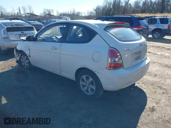2008 Hyundai Accent GS with VIN KMHCM36C68U055850, listed as a IAAI auction lot 41590651 with 198,827 mi miles. Bid and sale history available at carsss.com. Image 3.