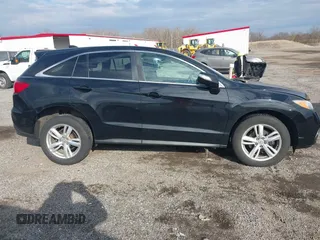 2015 Acura RDX z VIN 5J8TB3H30FL005814, wystawiony jako IAAI lot #41665912 z przebiegiem 93 879 mil mil oraz . Historia ofert i sprzedaży dostępna na DreamBid. Obrazek 14.