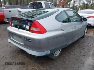 2001 Honda Insight z VIN JHMZE14711T003249, wystawiony jako IAAI lot #41526548 z przebiegiem 123 871 mil mil oraz . Historia ofert i sprzedaży dostępna na DreamBid. Obrazek 4.
