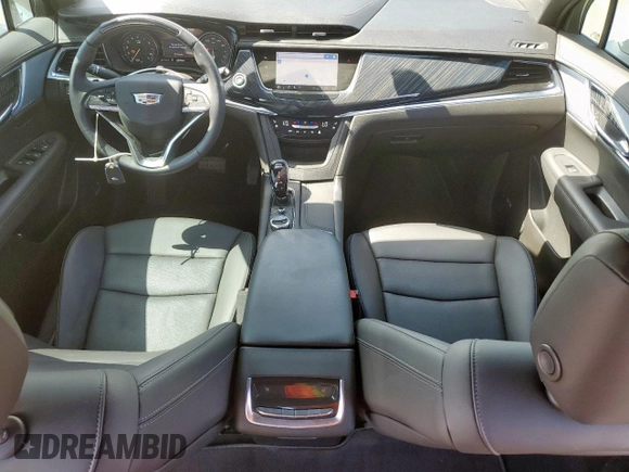 2024 Cadillac XT6 FWD Premium Luxury with VIN 1GYKPCRS7RZ711983, listed as a Copart auction lot 64842625 with 6,394 mi miles and Clean title. Bid and sale history available at DreamBid. Image 8.