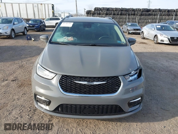 2021 Chrysler Pacifica Touring L with VIN 2C4RC1BG4MR598328, listed as a IAAI auction lot 41749306 with 78,035 mi miles and . Bid and sale history available at DreamBid. Image 12.