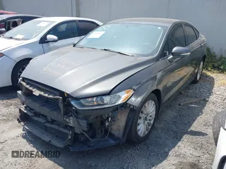 2016 Ford Fusion SE Hybrid z VIN 3FA6P0LU0GR218685, wystawiony jako IAAI lot #42550930 z przebiegiem 178 041 mil mil oraz . Historia ofert i sprzedaży dostępna na DreamBid. Obrazek 2.
