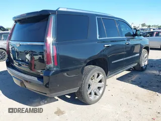 2017 Cadillac Escalade Premium Luxury z VIN 1GYS4CKJ6HR239428, wystawiony jako IAAI lot #42221451 z przebiegiem 87 421 mil mil oraz . Historia ofert i sprzedaży dostępna na DreamBid. Obrazek 4.