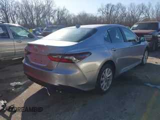 2023 Toyota Camry LE z VIN 4T1C11AK1PU771615, wystawiony jako IAAI lot #41679085 z przebiegiem 20 230 mil mil oraz . Historia ofert i sprzedaży dostępna na DreamBid. Obrazek 4.