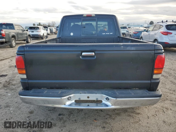 1999 Mazda B-Series 2WD Truck SE with VIN 4F4YR16V7XTM42999, listed as a Copart auction lot 42342714 with 152,152 mi miles and Salvage Title. Bid and sale history available at carsss.com. Image 6.