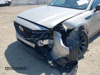 2025 Mazda CX-90 Premium Sport z VIN JM3KKCHA7S1225053, wystawiony jako IAAI lot #42011437 z przebiegiem 259 mil mil oraz . Historia ofert i sprzedaży dostępna na DreamBid. Obrazek 6.