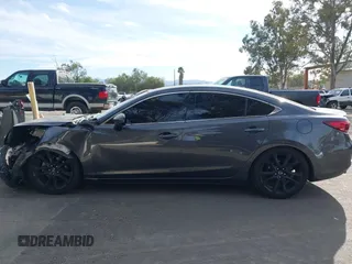2016 Mazda Mazda6 i Grand Touring with VIN JM1GJ1W57G1441102, listed as a IAAI auction lot 41687057 with 144,876 mi miles. Bid and sale history available at carsss.com. Image 14.
