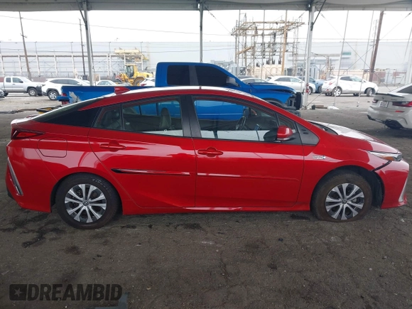 2021 Toyota Prius LE with VIN JTDKAMFP6M3189145, listed as a IAAI auction lot 42021116 with 80,722 mi miles and . Bid and sale history available at DreamBid. Image 13.
