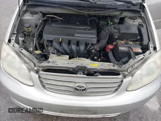 2003 Toyota Corolla CE with VIN 2T1BR32E13C038971, listed as a IAAI auction lot 42027458 with 227,808 mi miles. Bid and sale history available at carsss.com. Image 10.