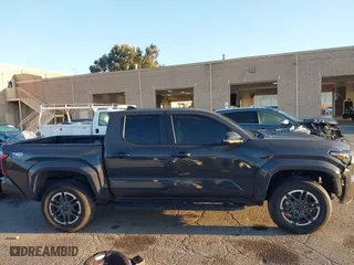 2024 Toyota Tacoma 4WD SR5 with VIN 3TMLB5JN3RM046513, listed as a IAAI auction lot 41231528 with 7,091 mi miles. Bid and sale history available at carsss.com. Image 13.
