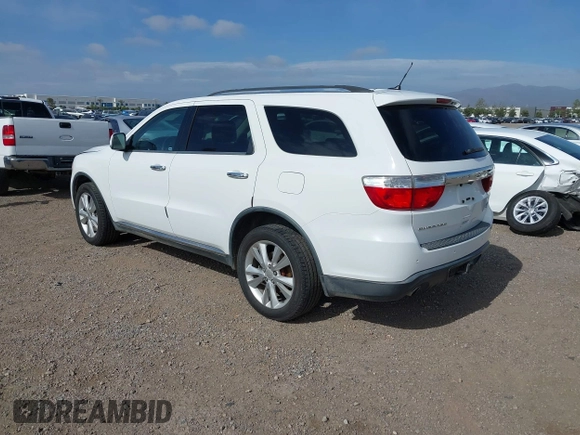 2013 Dodge Durango Crew with VIN 1C4SDHDT2DC679600, listed as a IAAI auction lot 42215737 with 128,499 mi miles and . Bid and sale history available at DreamBid. Image 3.