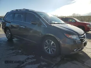 2015 Honda Odyssey Touring Elite with VIN 5FNRL5H94FB037299, listed as a Copart auction lot 53886345 with 109,032 mi miles and Salvage Title. Bid and sale history available at DreamBid. Image 4.