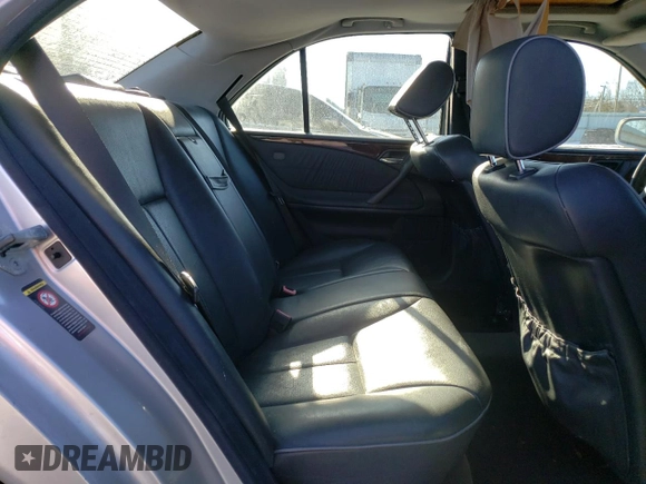 2000 Mercedes-Benz E-Class with VIN WDBJF82J5YX030071, listed as a Copart auction lot 42430025 with 122,612 mi miles and Salvage Title. Bid and sale history available at carsss.com. Image 10.