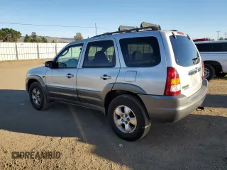 2001 Mazda Tribute LX with VIN 4F2CU08111KM20113, listed as a Copart auction lot 87681195 with 144,400 mi miles and Salvage Title. Bid and sale history available at DreamBid. Image 2.