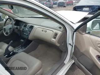 2001 Honda Accord EX z VIN 1HGCG16551A053095, wystawiony jako IAAI lot #41892751 z przebiegiem Nie podano mil oraz . Historia ofert i sprzedaży dostępna na DreamBid. Obrazek 5.