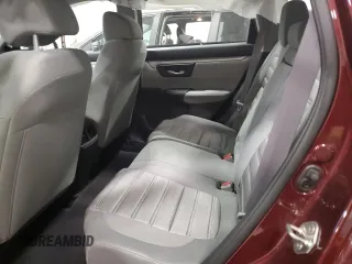 2019 Honda CR-V LX z VIN 2HKRW6H3XKH205824, wystawiony jako Copart lot #59087485 z przebiegiem Nie podano mil oraz Szkoda całkowita • Salvage title. Historia ofert i sprzedaży dostępna na DreamBid. Obrazek 11.