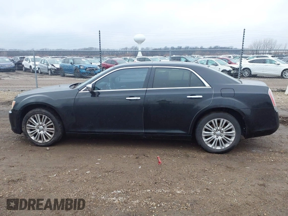 2013 Chrysler 300 with VIN 2C3CCAKG7DH619334, listed as a IAAI auction lot 41193765 with 162,662 mi miles. Bid and sale history available at carsss.com. Image 14.