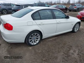 2011 BMW 3 Series 328i xDrive with VIN WBAPK5C55BF122623, listed as a IAAI auction lot 41868600 with 105,948 mi miles. Bid and sale history available at carsss.com. Image 4.