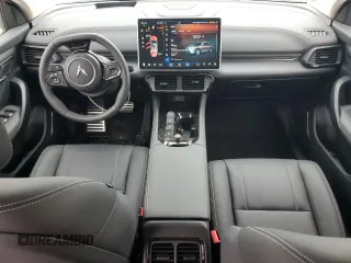 2024 VinFast VF 8 Eco z VIN RLLV1AEB7RH004473, wystawiony jako Copart lot #57440575 z przebiegiem 2336 mil mil oraz Tytuł czysty. Historia ofert i sprzedaży dostępna na DreamBid. Obrazek 8.