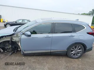2021 Honda CR-V Touring with VIN 7FART6H91ME022993, listed as a IAAI auction lot 42439344 with 30,477 mi miles and . Bid and sale history available at DreamBid. Image 15.