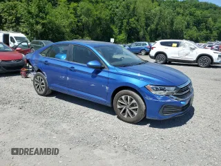 2023 Volkswagen Jetta S with VIN 3VW5M7BU6PM042471, listed as a Copart auction lot 56950155 with 7,043 mi miles and Salvage title. Bid and sale history available at DreamBid. Image 4.